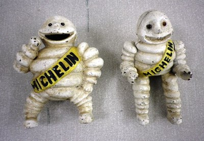Lot 16 - Cast metal Michelin men