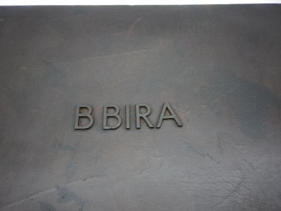 Lot 124 - Early leather suitcase - B Bira