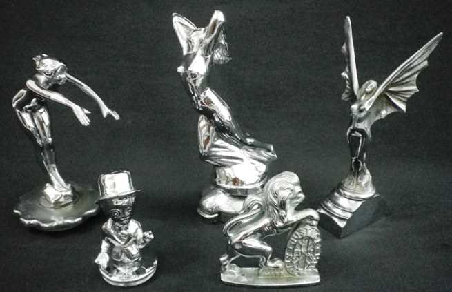 Click for high resolution Lot 24 - Six motoring mascots