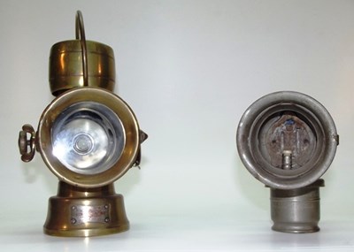 Lot 058 - Two Powell & Hammer brass lamps