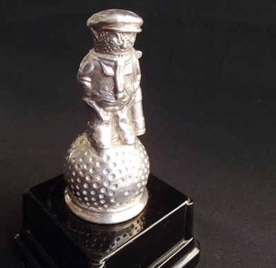 Lot 102 - Golfer standing on a ball mascot