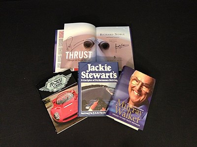 Lot 075 - Four signed motoring books