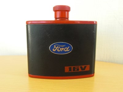 Lot A31 - A rarely-found Ford Rally Driver's black leather and red enamelled refreshment Flask