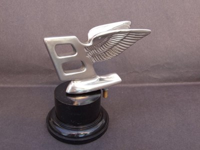 Lot 135 - a Bentley 'S' series flying 'B' car mascot in nickel plated brass