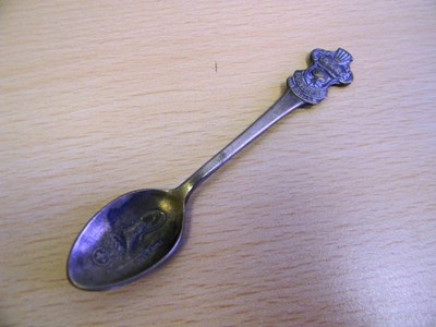 Lot 158 - An unusual bronze advertising coffee spoon for Rolex Drivers' watches