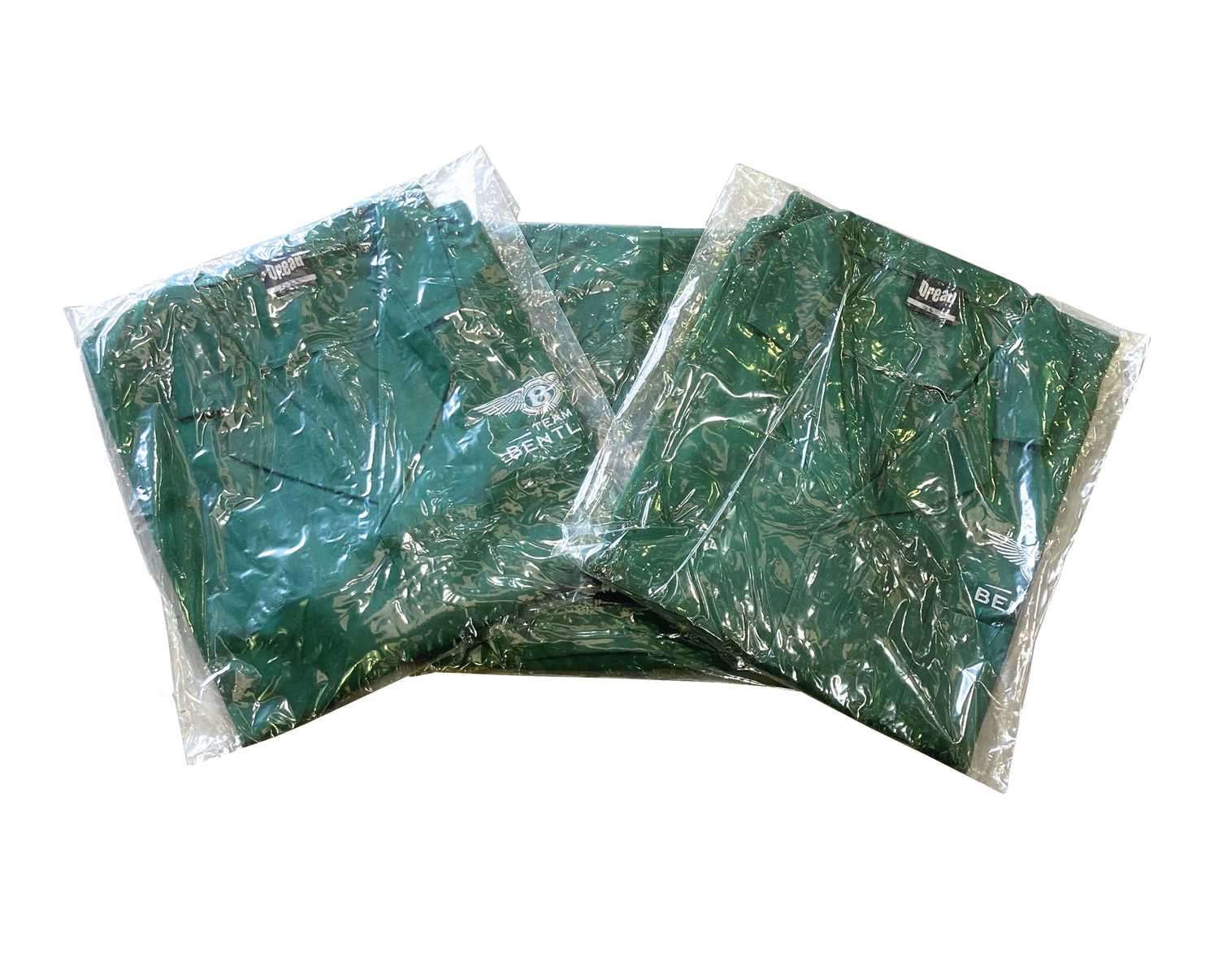 Click for high resolution Lot 72 - 10 Team Bentley green workshop overall/jackets