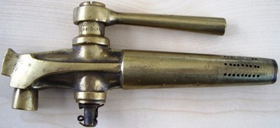 Lot 115 - An early brass tap