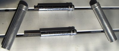 Lot 132 - Two early tyre pressure gauges