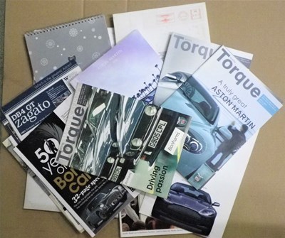 Lot 9 - A selection of Aston Martin publications including brochures, journals and others.