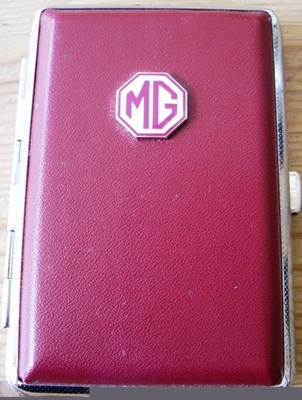 Lot 176 - MG, A maroon and chrome cigarette case