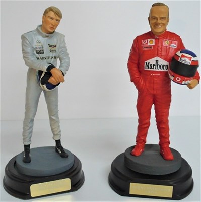 Lot 26 - Two 1/8 scale resin motor racing driver figures. Rubens Barrichello and Mika Hakkinen.