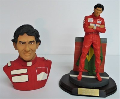 Lot 27 - Two 1/8 scale resin motor racing driver figures, both showing three times Formula 1 World Champion, Ayrton Senna.