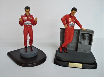 Lot 36 - Two 1/8 scale motor racing driver figures, both of Michael Schumacher
