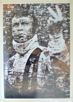 Lot 54 - A limited edition, framed and glazed print of Enzo Ferrari. This shows an early shot of Enzo sitting in a race car superimposed with a collage of related smaller photos.