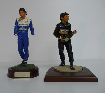 Lot 90 - Two 1/8 scale motor racing driver figures, both Ayrton Senna.