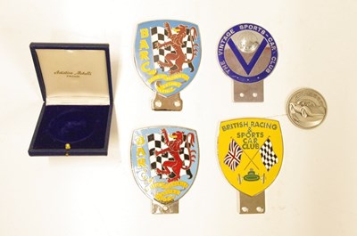 Lot 9 - An original enamel BARC badge and three modern badges