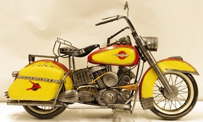 Lot 19 - A large model of a motor cycle in the style of a Harley Davidson.
