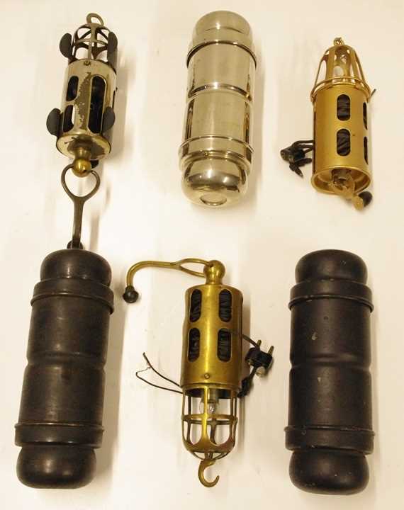 Click for high resolution Lot 43 - Three early vehicle lead lights and three Lucas bulb holders as fitted to early Roll-Royce motor cars.