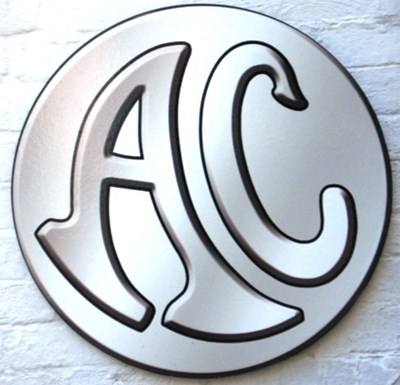 Lot 76 - An AC wall plaque