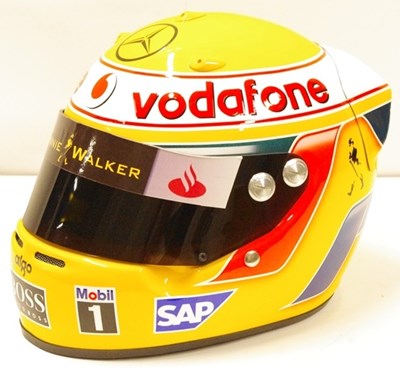 Lot 111 - A full-size replica helmet from Lewis Hamilton’s first F1 Championship year in the iconic ‘Senna’ yellow tribute colour scheme