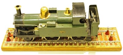 Lot 125 - A 5 ¼” inch live steam train. This has been professionally built to a good standard and comes sitting on a section of track.