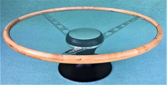 Click for high resolution Lot 127 - A large reception/coffee table, hand-made by a British craftsman in the form of a classic car steering wheel.