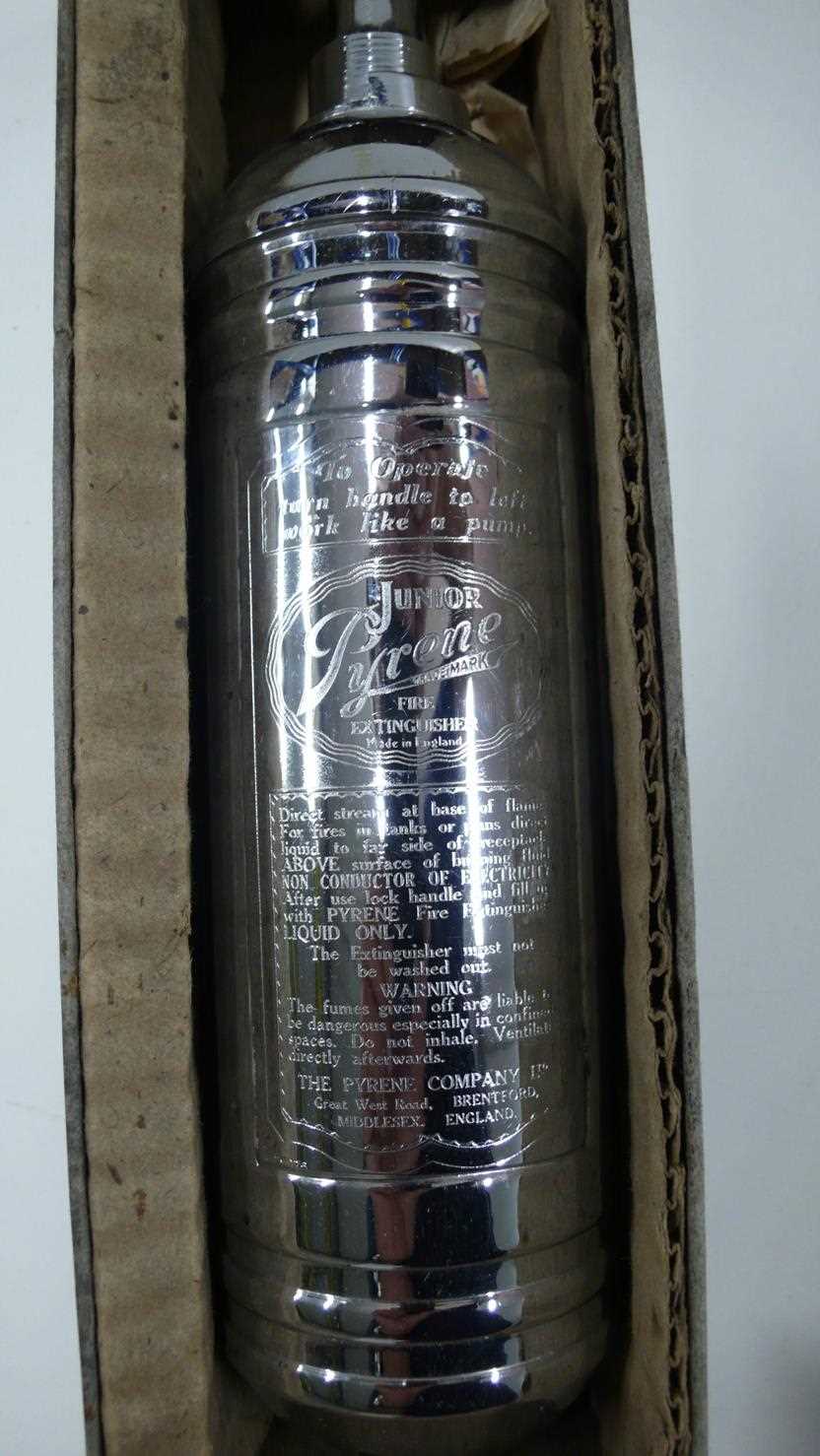 Lot 9 - An early black Rexene motorists travelling