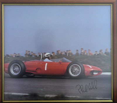 Lot 18 - A framed and glazed print showing Phil Hill driving a Ferrari 156 Shark Nose