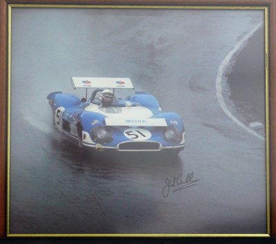 Lot 29 - A framed and glazed print showing Jack Brabham driving a Matra sports racing car