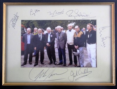 Lot 43 - A framed and glazed photo of famous racing drivers