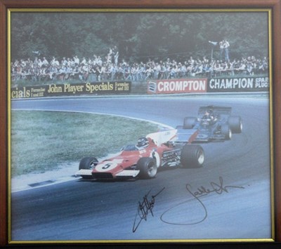 Lot 44 - A framed and glazed print showing Emerson Fittipaldi