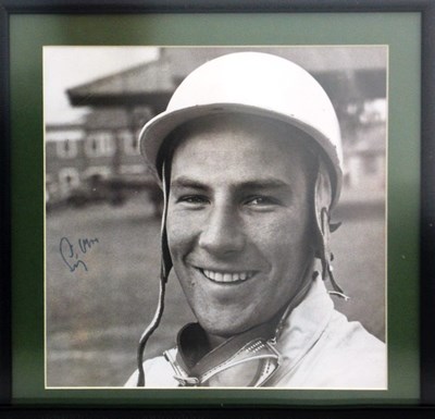 Lot 53 - A framed and glazed print showing a young Stirling Moss