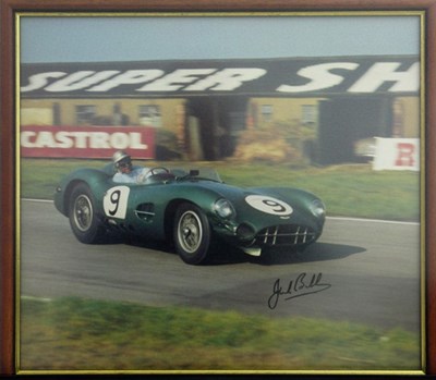 Lot 55 - A framed and glazed print showing Jack Brabham