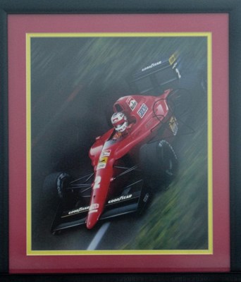 Lot 64 - A print showing Nigel Mansell driving a Ferrari